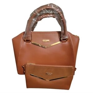 2 Piece JOY & Iman purse set NWOT
